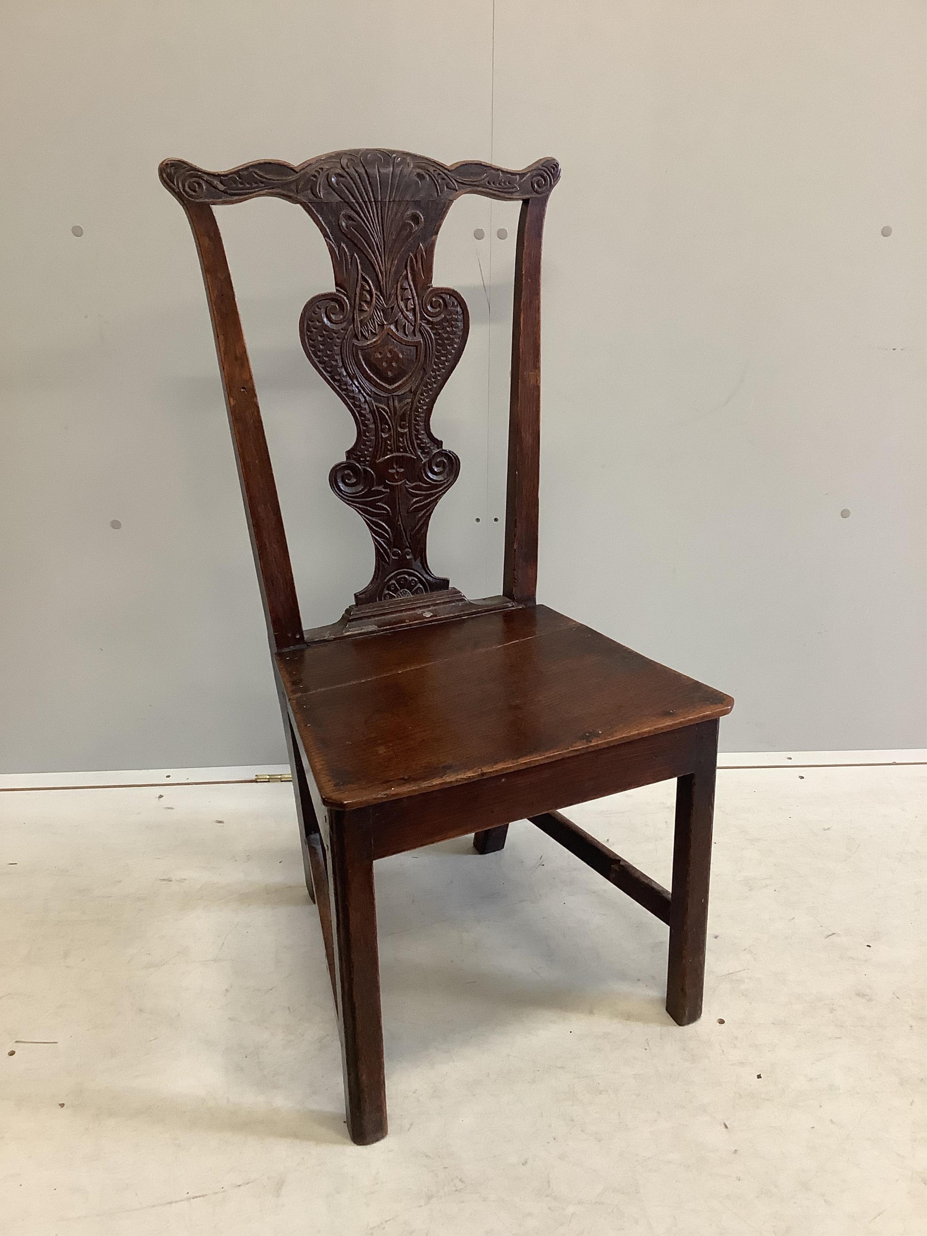 A harlequin set of six country Chippendale style, carved oak dining chairs. Condition - fair